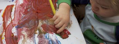 toddler-boy-painting-DWU4AKQ